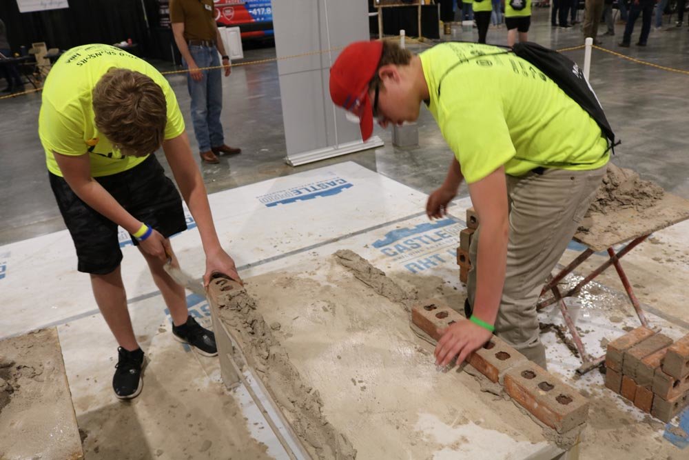 Career Test Drive
Students learn to lay brick and other construction skills during the April 17 Build My Future Construction Showcase at the Ozark Empire Fairgrounds. Construction industry leaders say over 2,700 students from 77 regional schools and programs were on hand to participate in some 75 exhibits.